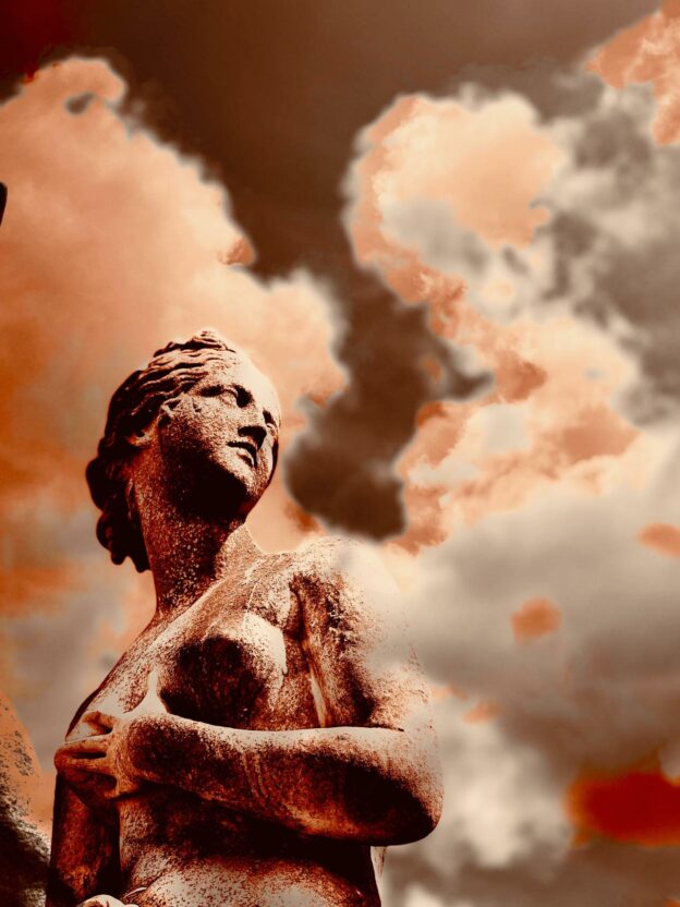 Statue against a cloudy sky